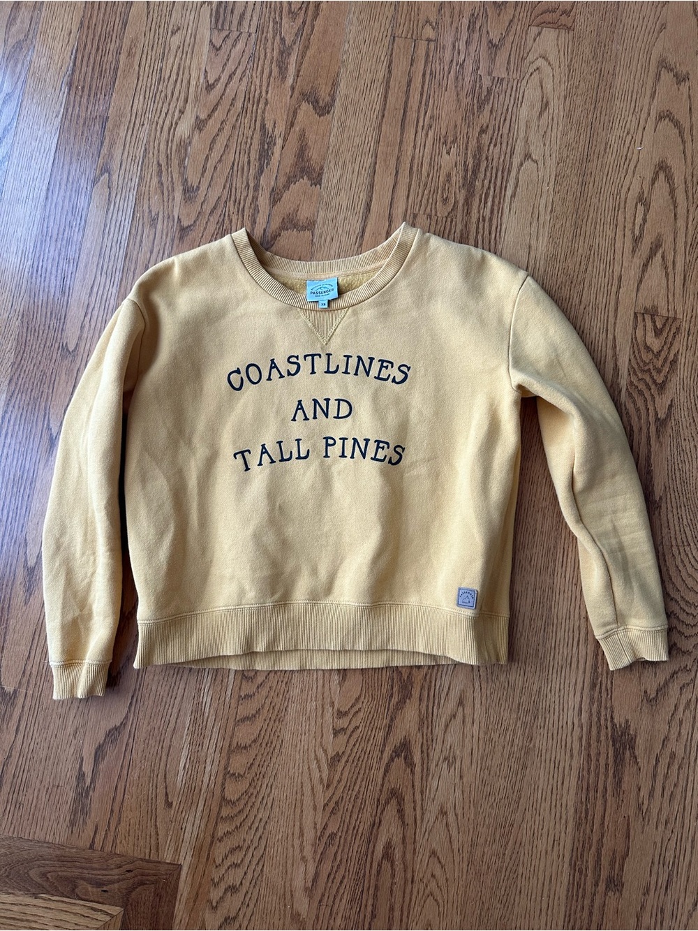 Passenger coastlines and tall pines mustard sweatshirt